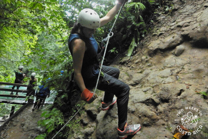 rappelling down rock pure trek tour