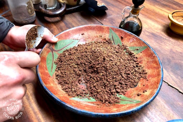 a pottery bowl with ground chocolate