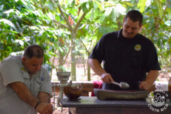 two people cooking